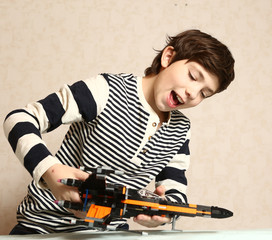 boy play war with plain close up photo