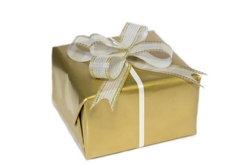 gold gift box with ribbon isolated on white