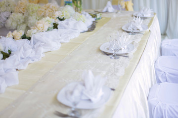 Fototapeta na wymiar Table Setting at a Wedding Reception. Selective Focus.