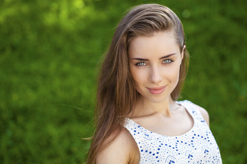 Portrait close up of young beautiful brunette woman