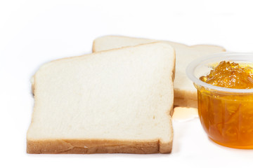 slice toast  and marmalade jam 
slice toast  and marmalade jam on a white background