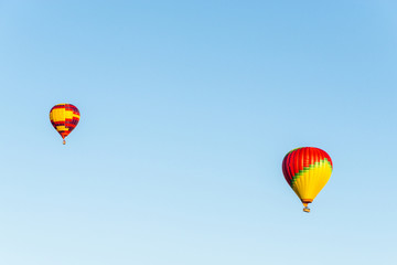Air balloons above the clouds