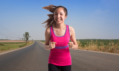 Running Asia woman. Female runner jogging during outdoor 