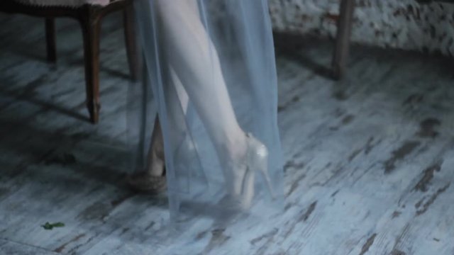 Close up Bride Wearing Shoes With Heels on the Floor