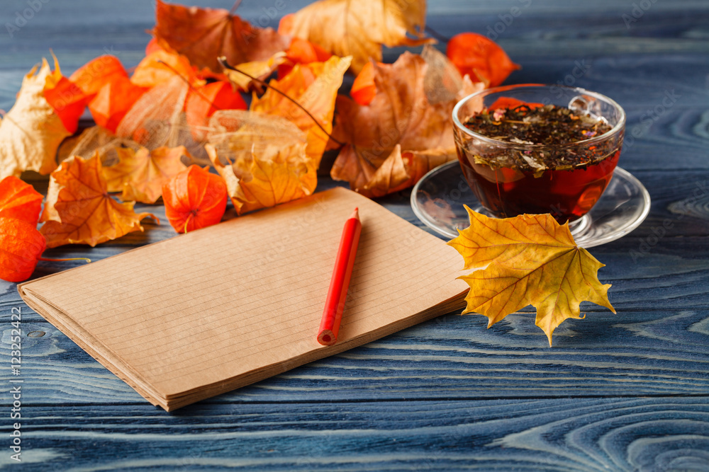 Canvas Prints blank notepad and colorful autumn maple leaves on wooden table b