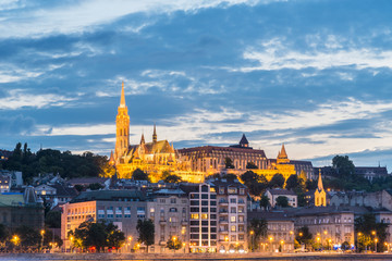 Fototapeta na wymiar Night view of Budapest with the St. Matthias Church and Fishermen's Bastion at the heart of Buda's Castle District, Hungary