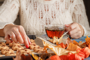 cup of tea,  autumn yellow and red leaves. autumn breakfast. sel