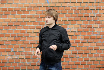 Attractive teenage boy in urban background