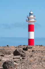 Fuerteventura, Isole Canarie: le rocce e il faro del Toston, vicino al villaggio di pescatori di El Cotillo, il 3 settembre 2016