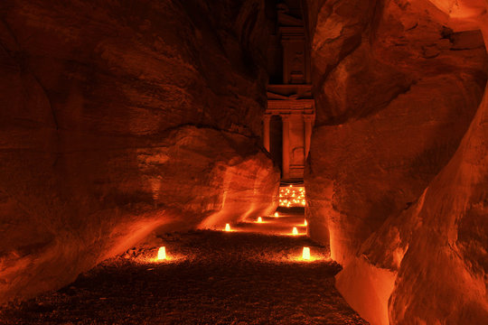 Illuminated Path to The Treasury (Al Khazneh) of Petra Ancient City, Jordan