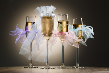 Beautiful decorated wedding glasses with champagne
