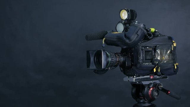 Broadcast camera isolated on a background. No people. 4K.