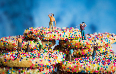 Miniature Figures Golfing on Sprinkle Cookies