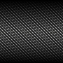 Vector black carbon fiber background. Realistic illustration