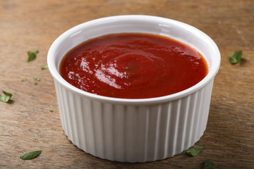 Bowl with tomato sauce or ketchup