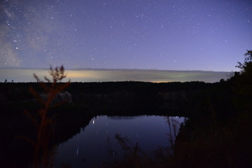 The night sky over the flooded crater