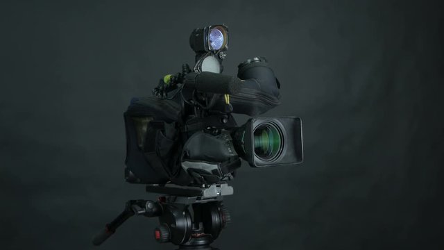 Studio camera at a broadcast news studio. 4K.