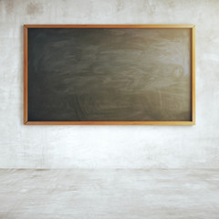 Chalkboard on concrete wall