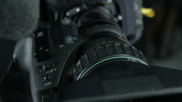 Studio camera at a broadcast news studio. 4K.