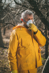 Obraz premium Spraying In The Orchard