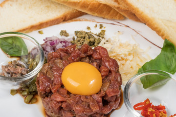 Beef tartare with egg and bread