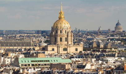 Fototapeta na wymiar The panorama of parisian houses and cathedral Saint Louis, Paris