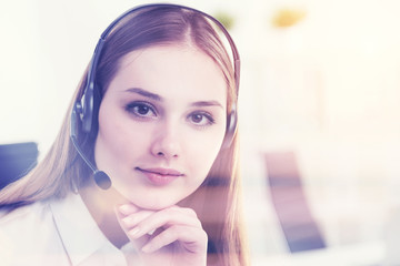 Businesswoman in headphones. Sunshine