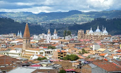 Foto op Aluminium View of the city of Cuenca, Ecuador, with it's many churches and rooftops, on a cloudy day © alanfalcony