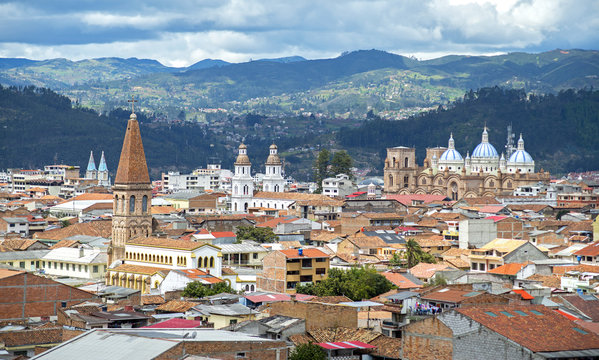 View of the city of Cuenca, Ecuador, with it's many churches and rooftops, on a cloudy day