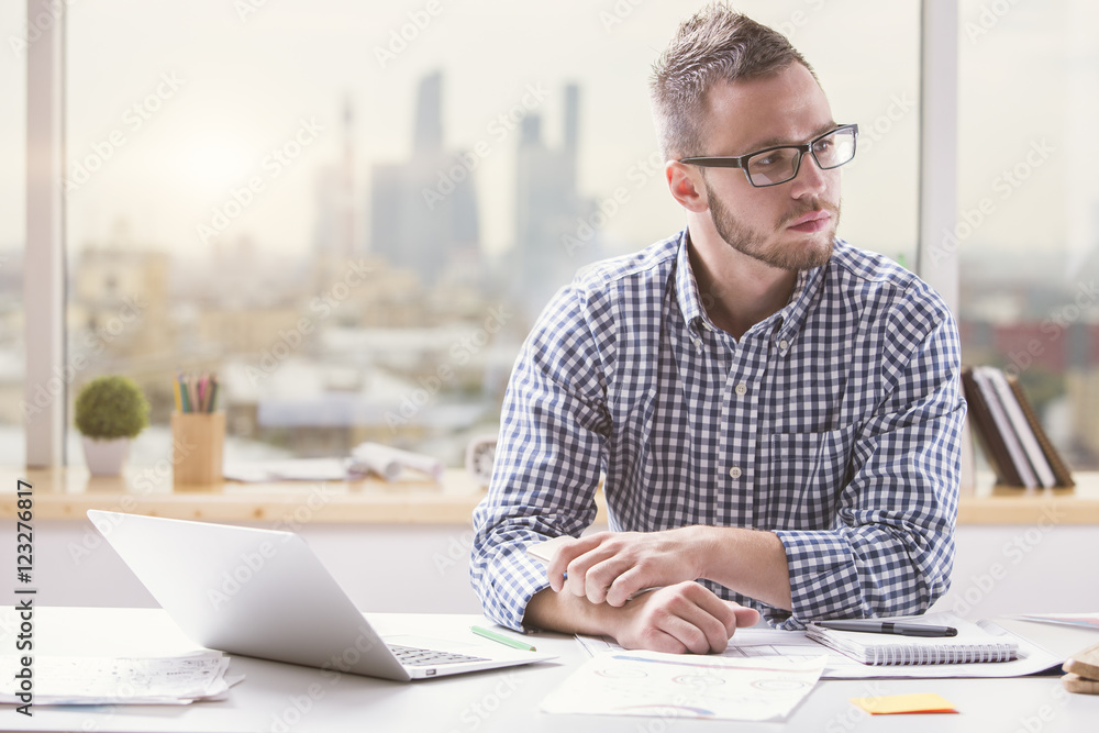 Poster thinking man at workplace