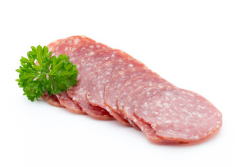 Salami smoked sausages slices isolated on white background.