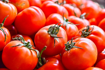 Fresh organic tomatoes on street market stall