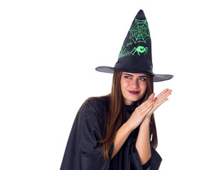 oung woman wearing in costume of the witch