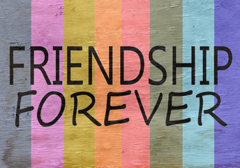 friendship forever design on colorful wood grain texture
