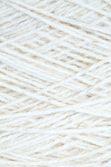 close up of wool thread bobbin