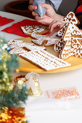 Decorating gingerbread cookies.