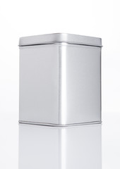 Emty tea steel container jar on white background © DenisMArt