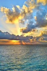 Fototapeta premium The sun rises over the horizon of the Indian Ocean in the early summer morning