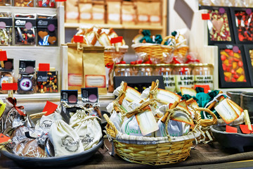 Chocolate sweets on shelves and baskets at Riga Christmas market