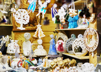Little angel statues displayed for sale at Riga Christmas market