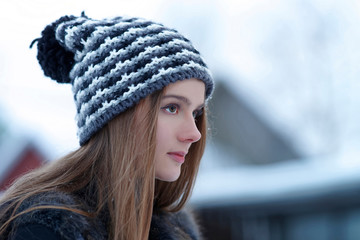 Young girl in winter Trakai in Lithuania
