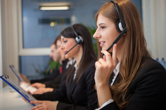 People at work in their office