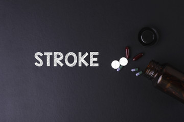 STROKE word with medicine and bottle - Health concept. Medical 