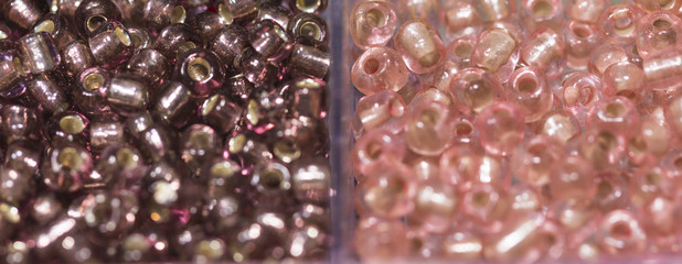 Lots of colorful fusible plastic beads used for arts and craft. 