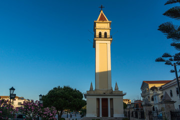 Obraz premium Sunset view of bell tower of Cathedral of Saint Dionysios in Zakynthos City, Greece