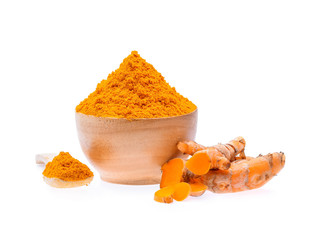 Turmeric roots with turmeric powder on white background