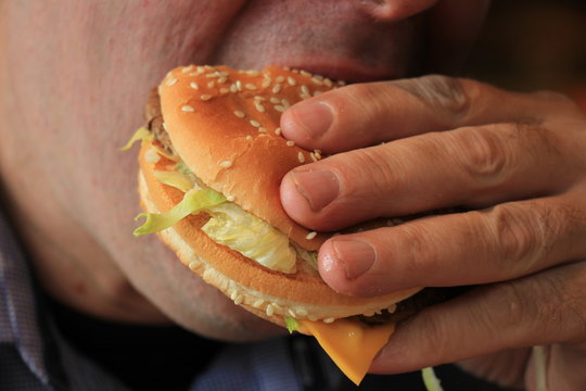 Man eating a hamburger