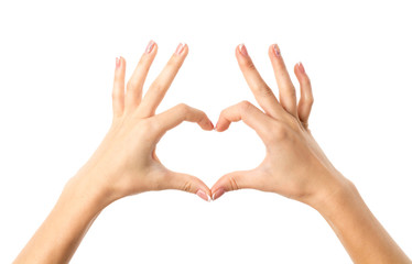 Woman's hands making heart