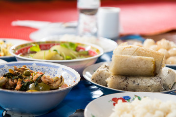 Glutinous rice roasted in bamboo joints.