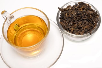 Cup of tea and Dried tea white background